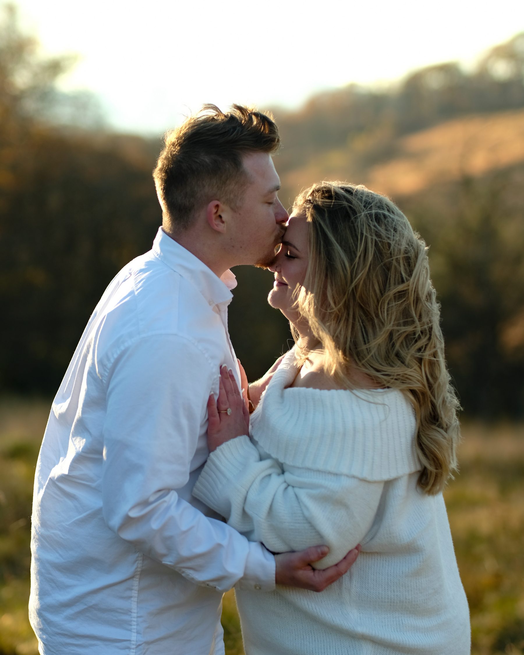 Braden kissing Aaryn's forehead